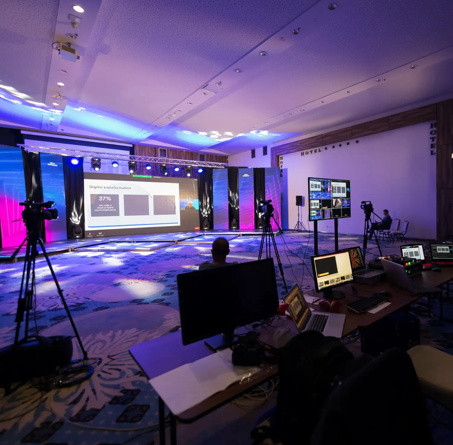 Golden Scope Media live event production crew filming a keynote stage